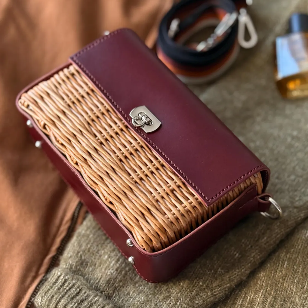 Deep Burgundy Trim Woven Rattan Rectangular Flap Purse With Silvery Twist Lock Hardware And Striped Fabric Shoulder Band