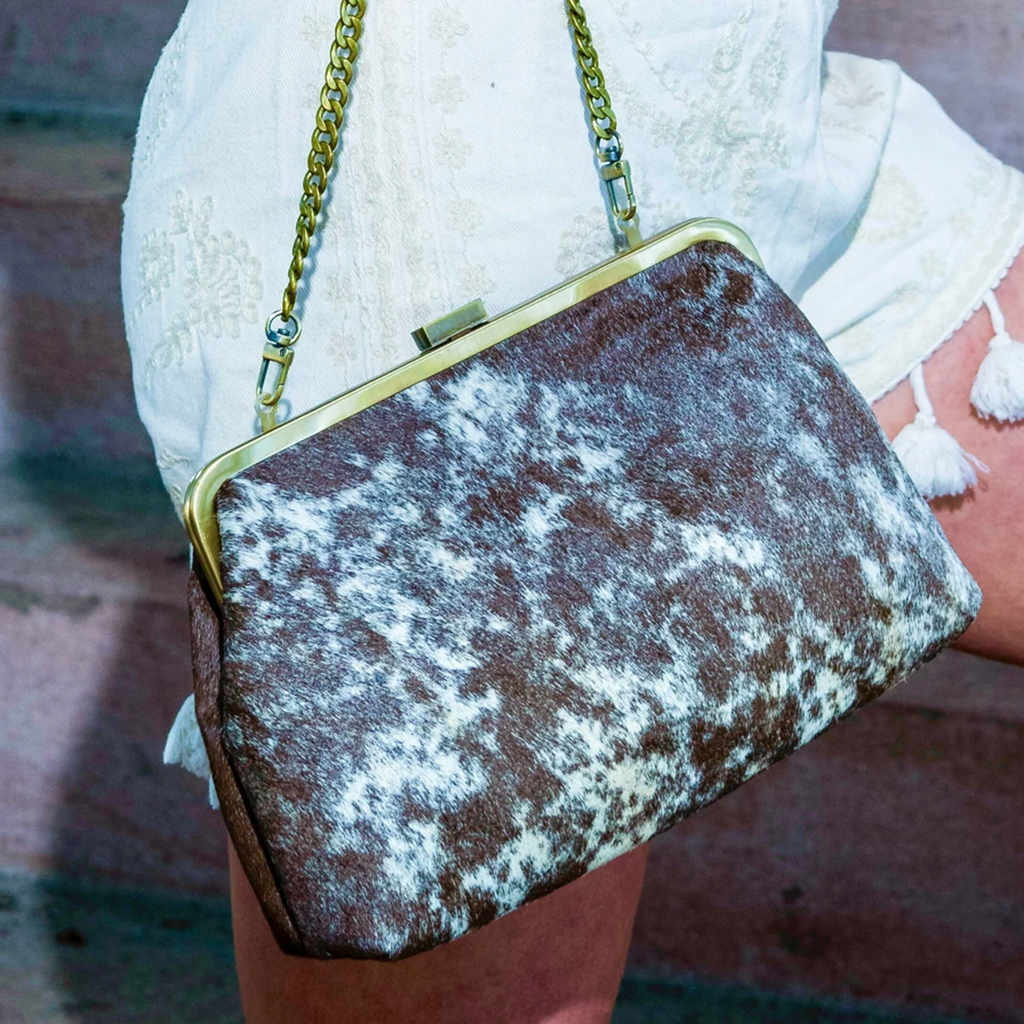 Mottled Brown And White Fuzzy Pattern Frame Clutch With Bronze Metal Rim Snap Clasp And Linked Metallic Carrying Chain