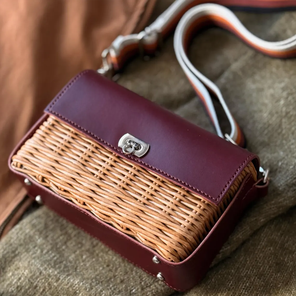 Deep Burgundy Trim Woven Rattan Rectangular Flap Purse With Silvery Twist Lock Hardware And Striped Fabric Shoulder Band